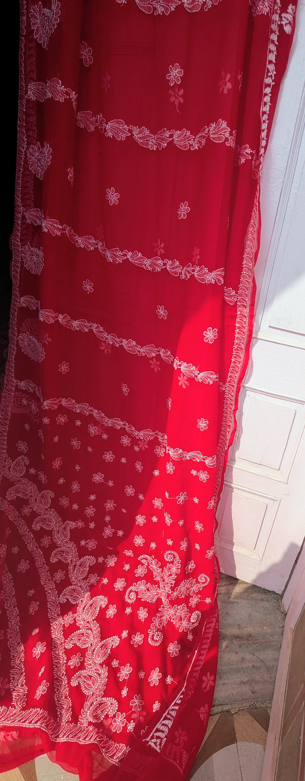 Red chikan saree with chaddi design